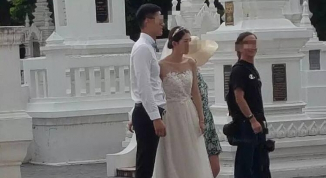 中国情侣在泰国寺庙拍婚纱照 引当地民众不满