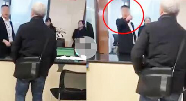 上班玩手机骂办事老人 涉事服务人员已被调离窗口